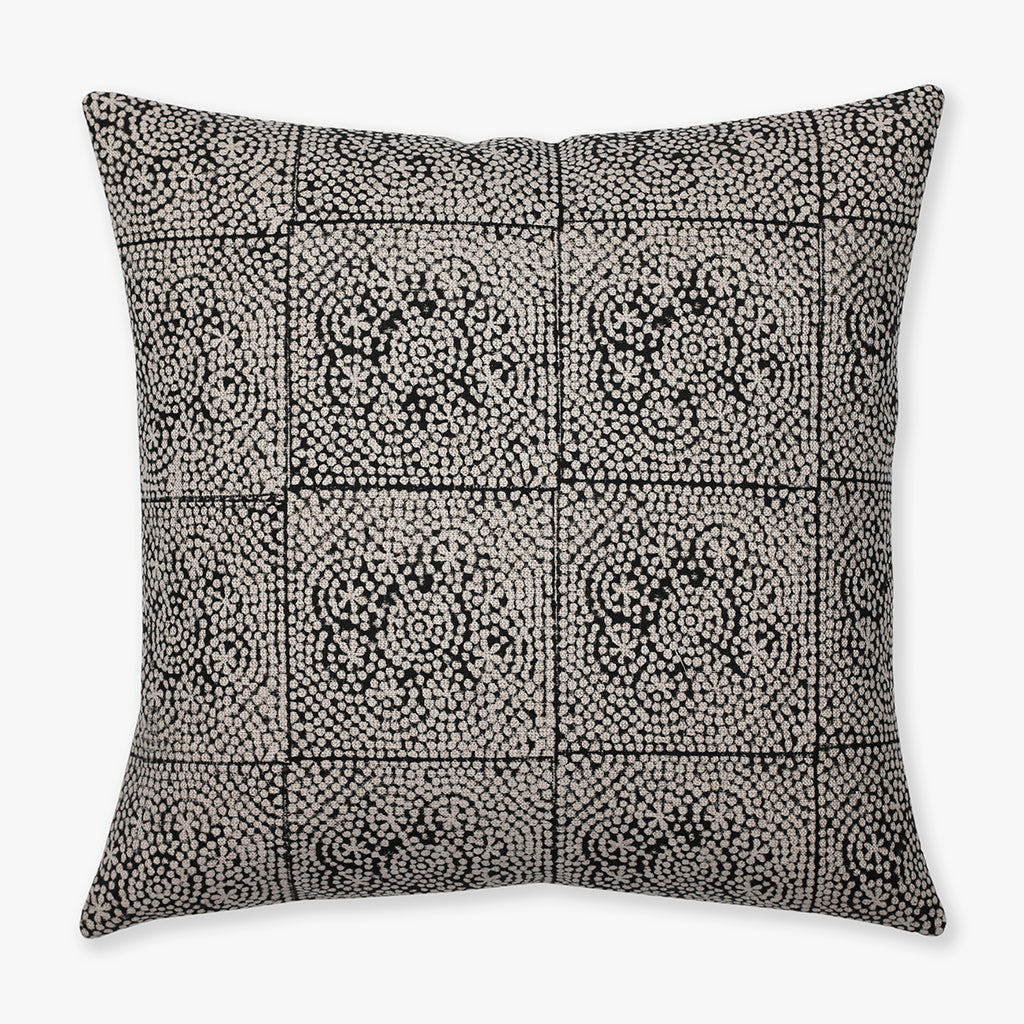 Anderson pillow cover showing flax and black dotted flower patterning.