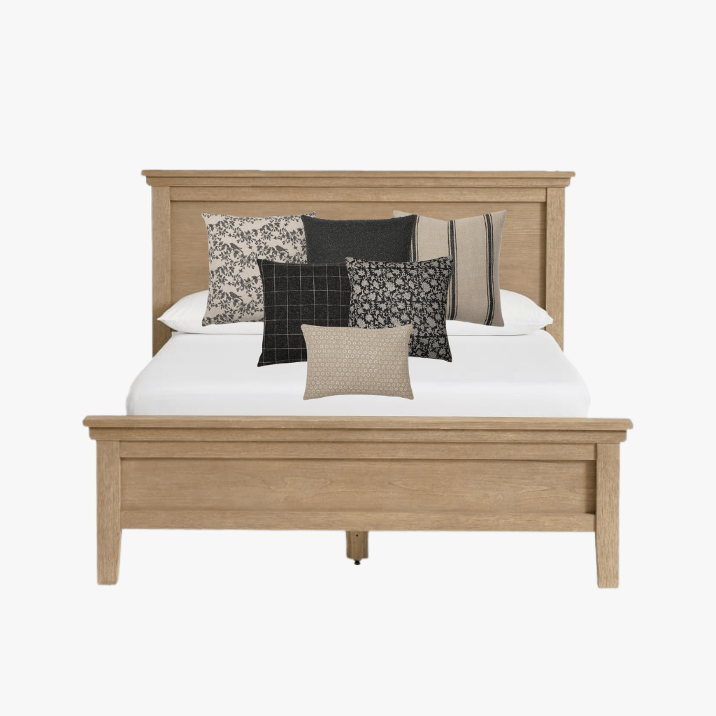 Sebastian Pillow Combo with Magnolia, Onyx, Maverick, Mavis, Felix, and Madison Lumbar on a bed with a wooden headboard