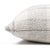 Side view of Tobias pillow cover from Colin and Finn, showing the white chunky pattern on the front and back of the pillow, separated by an invisible zipper. Pillow is set on a white background.