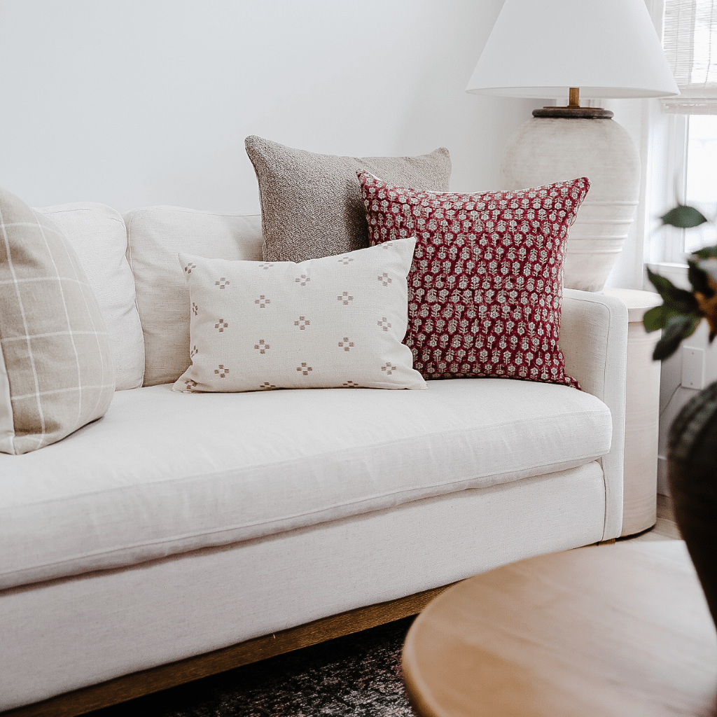 White sofa with online colorful pillows