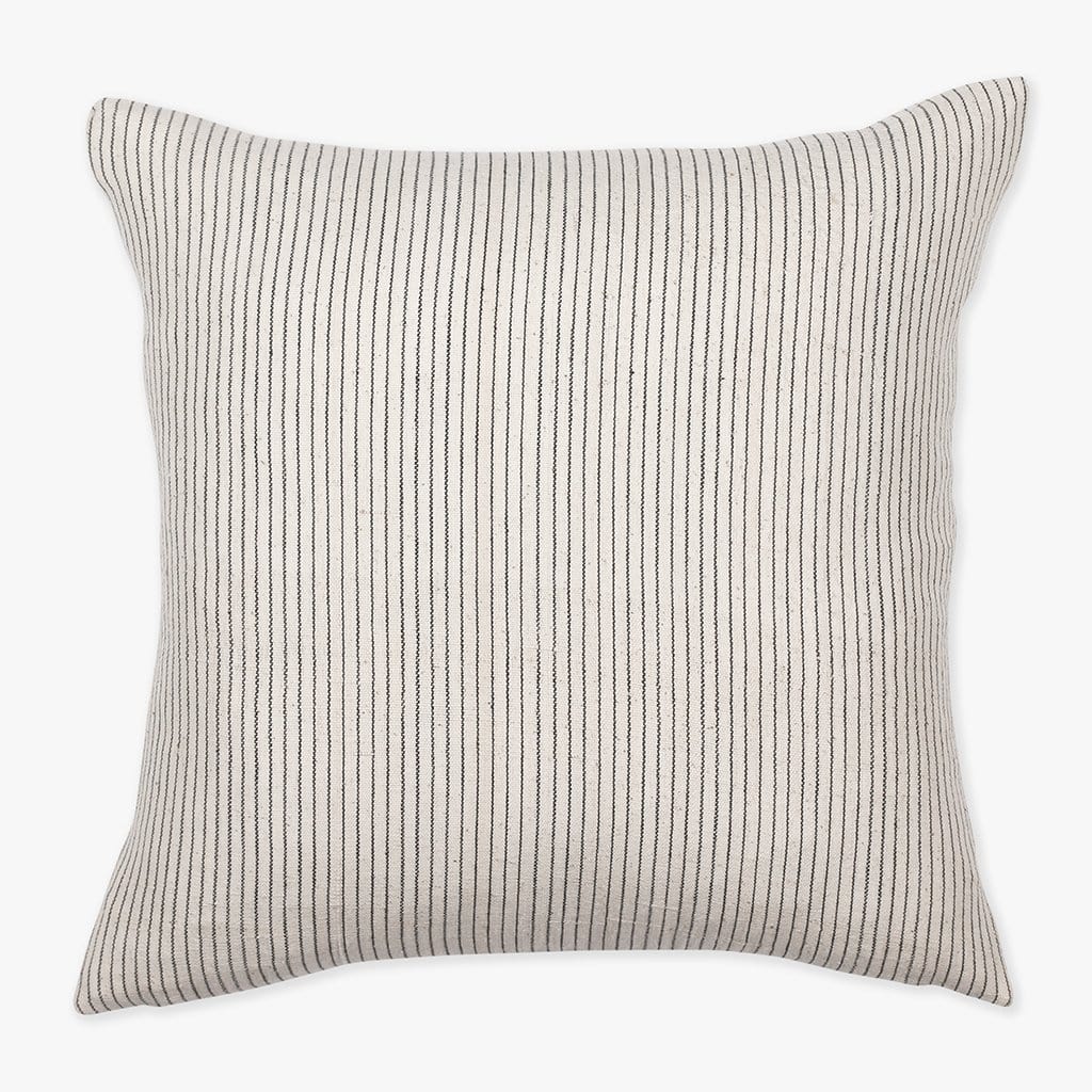 Laney pillow cover from Colin and Finn that&#39;s ivory with soft charcoal vertical stripes.