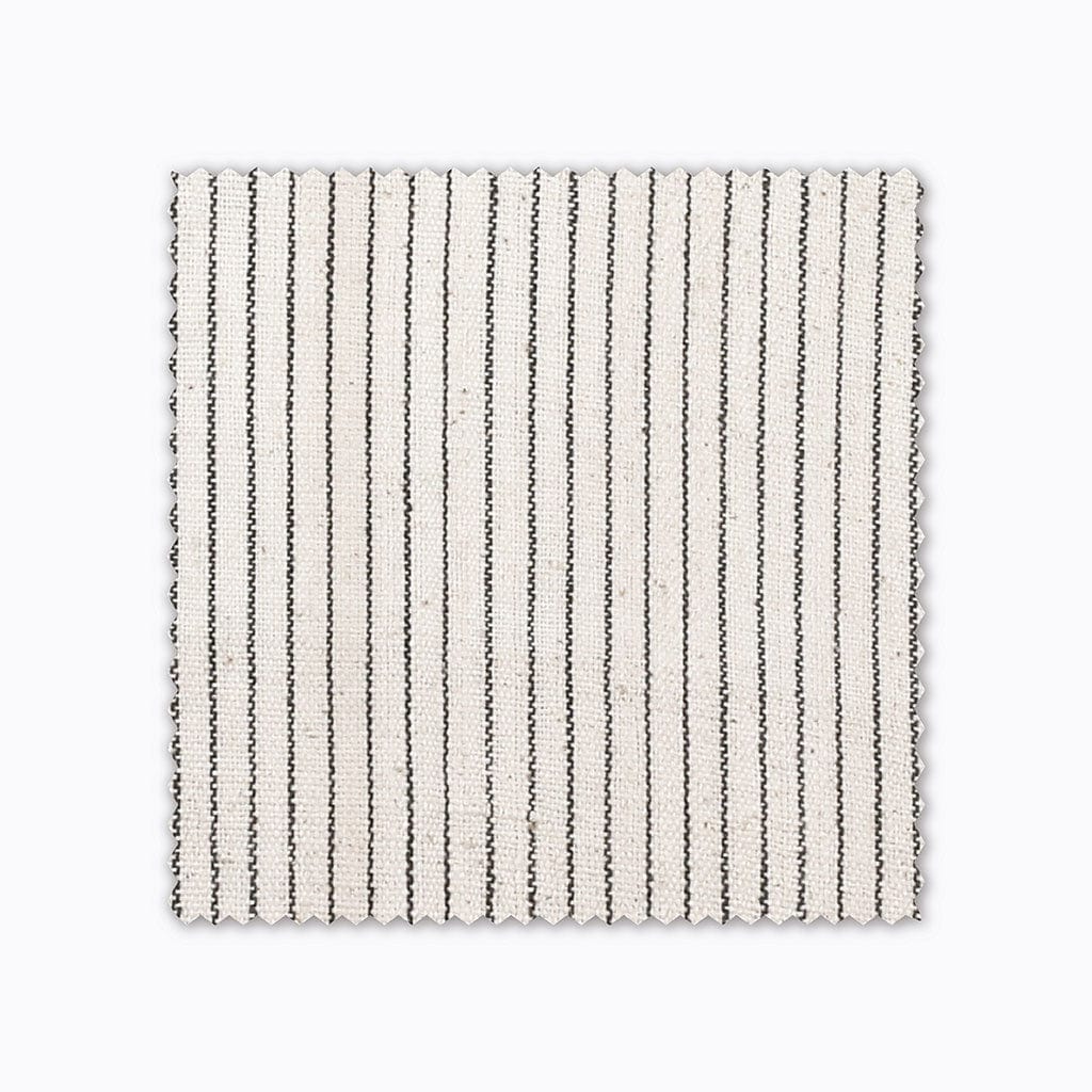 Laney fabric swatch from Colin and Finn. A charcoal stripe on handwoven ivory linen.