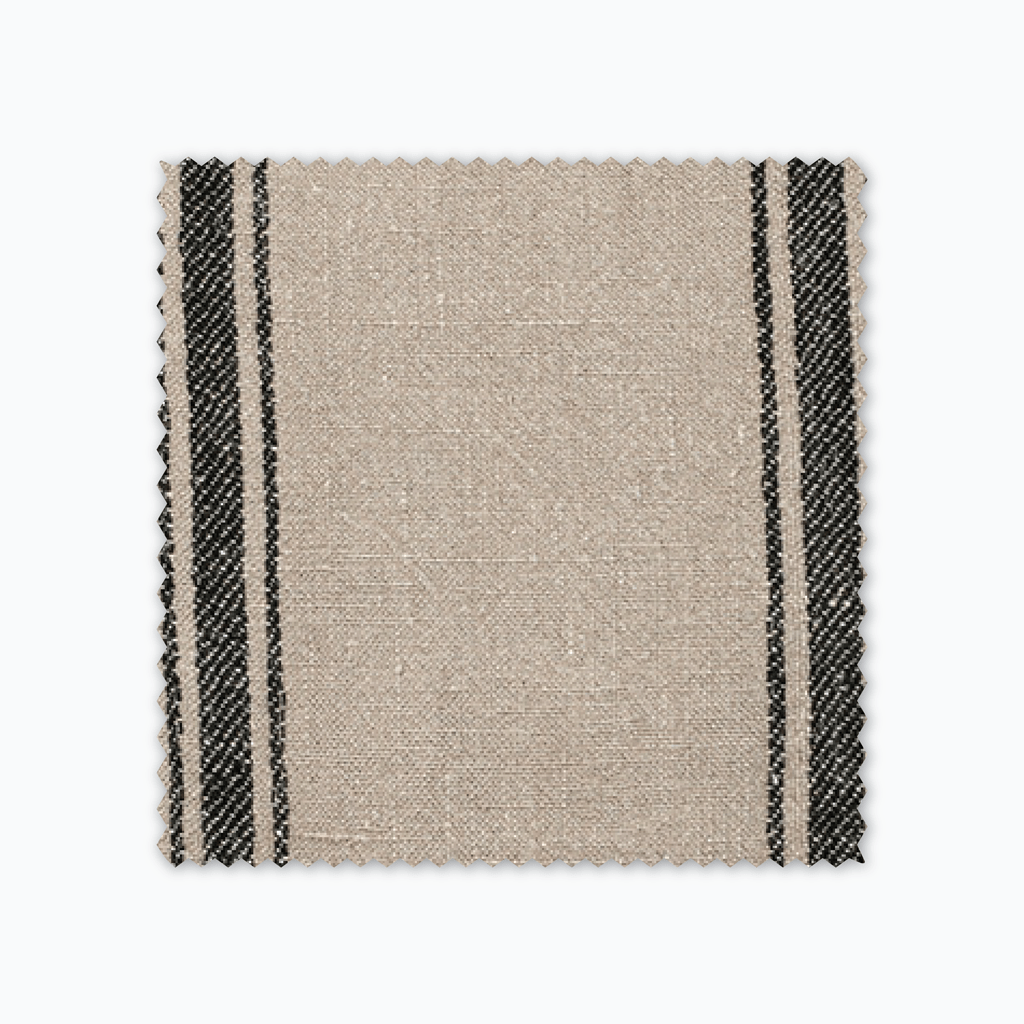 Maverick fabric swatch from Colin and Finn. Black stripes on a tan background. 