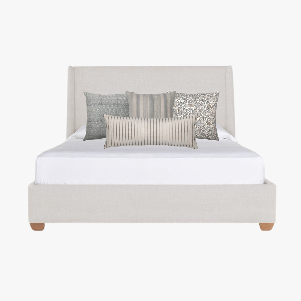 Cream upholstered headboard with Pearl pillow bedroom combo.