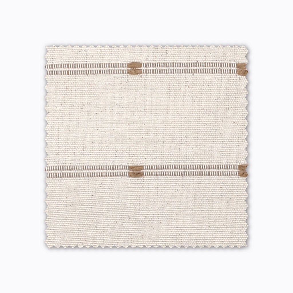 Rory fabric swatch from Colin and Finn. An ivory/cream Thai cotton with brown/tan woven stripes