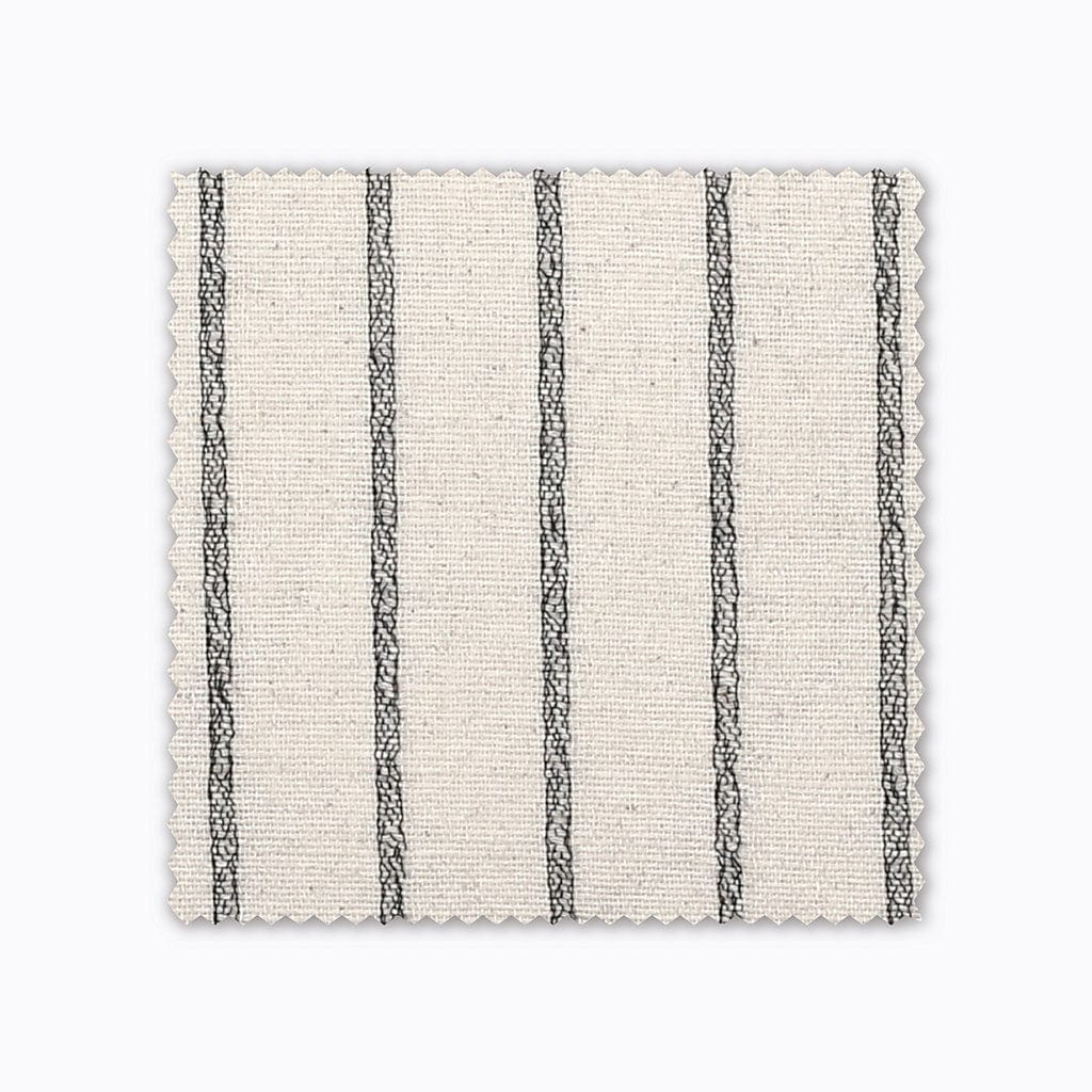 Winston fabric swatch from Colin and Finn. An ivory/cream Thai cotton with black woven stripes